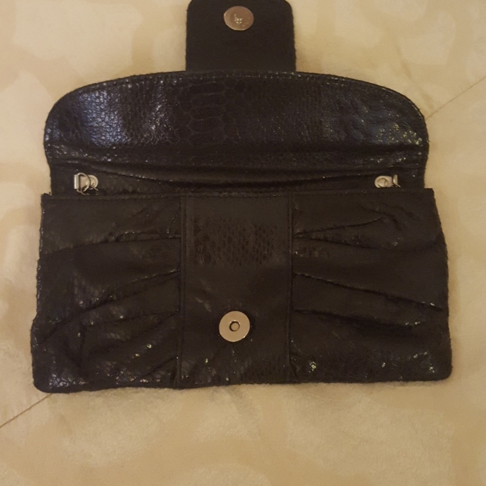 Jeweled holdover crossbody clutch in black